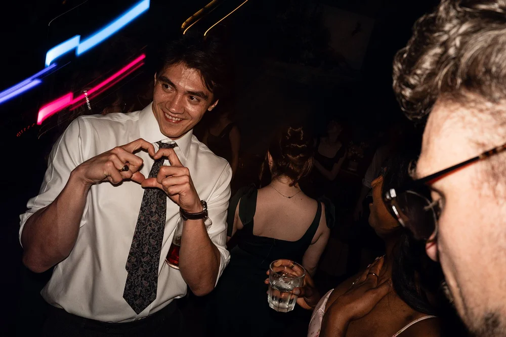 A guest making a heart on the dance floor, Southbank Club, Bristol