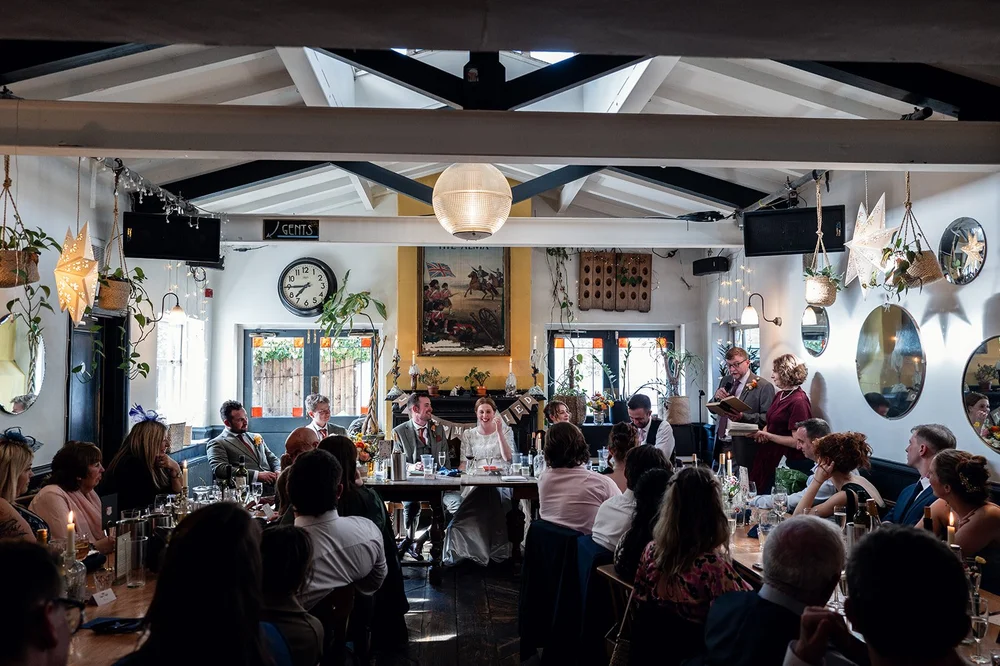 Guests seated for the wedding breakfast at the Alma Tavern, Bristol