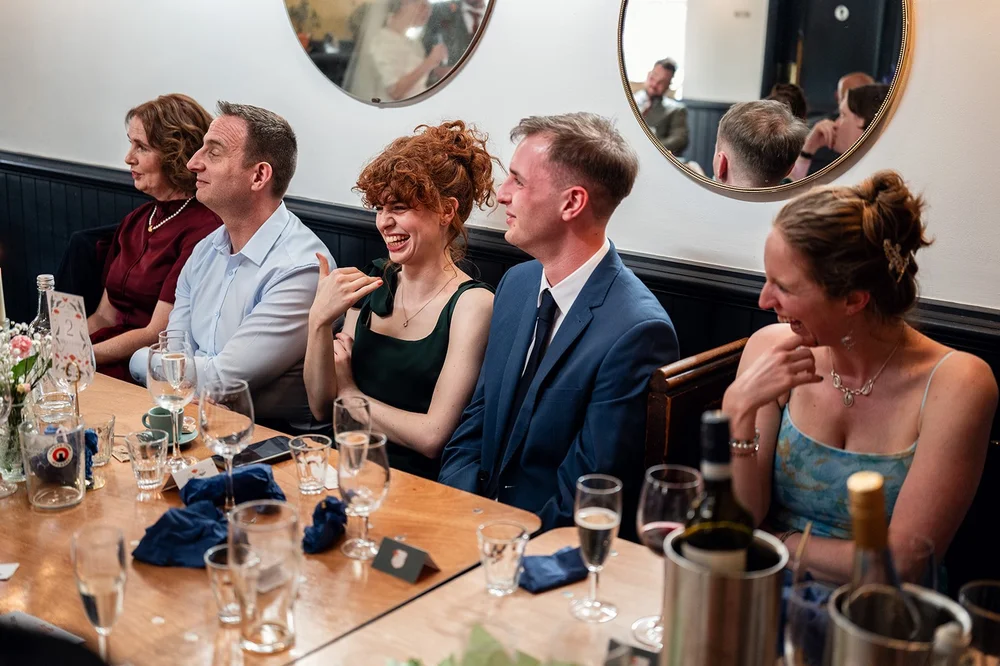 Guests around the long table at the Alma Tavern, Clifton