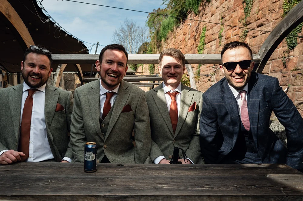 Tom and his groomsmen with a drink before the ceremony in Clifton