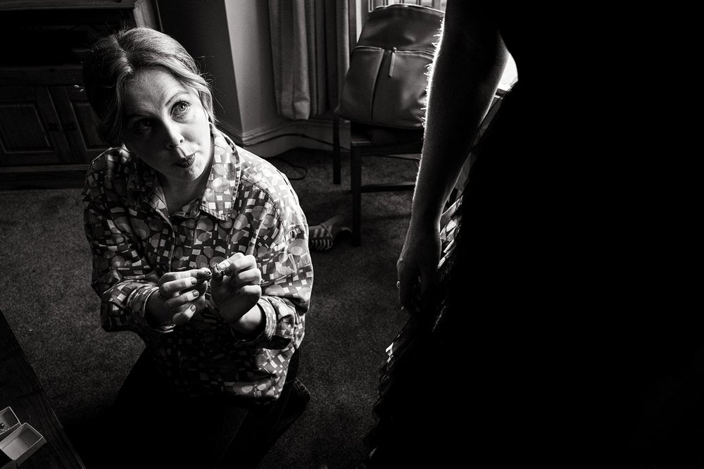 A guest catching a moment before the ceremony in Clifton