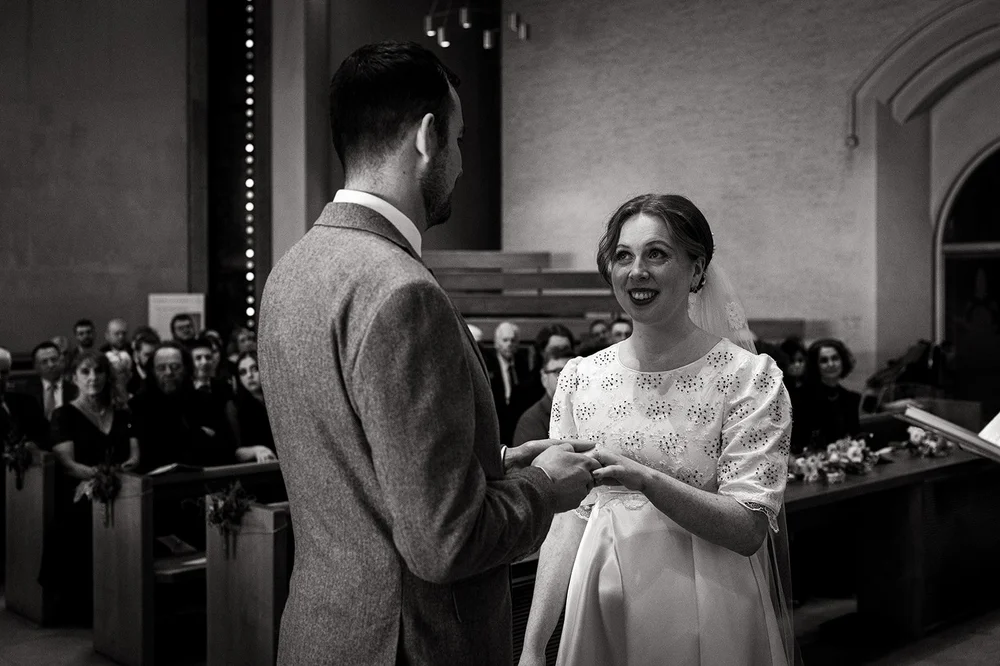 Ffion and Tom at the altar during their Clifton wedding ceremony