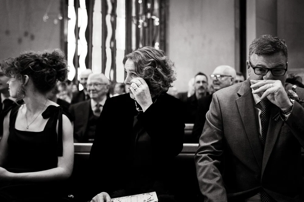Guests watching the register signing at the Clifton wedding ceremony