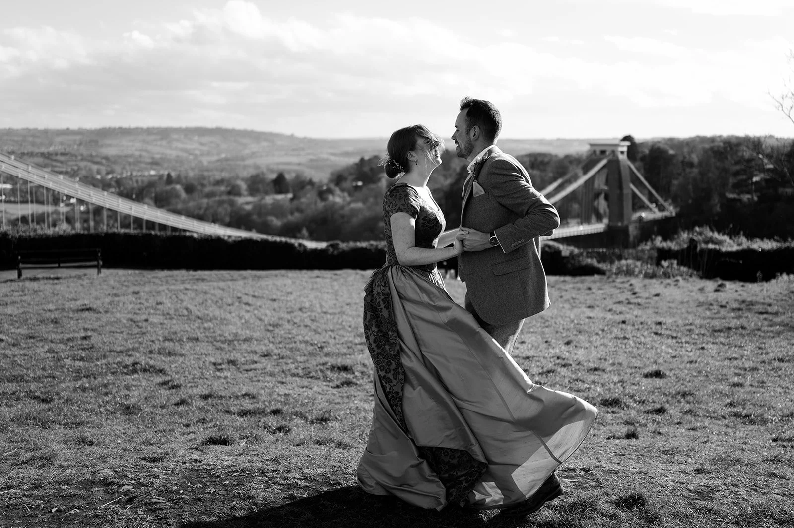 Ffion and Tom on the downs with the Clifton Suspension Bridge behind them, Bristol
