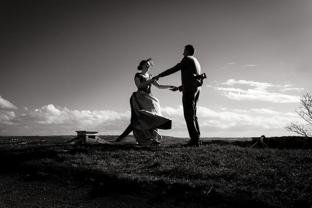 Ffion and Tom on the clifftop above the Avon Gorge at golden hour, Bristol