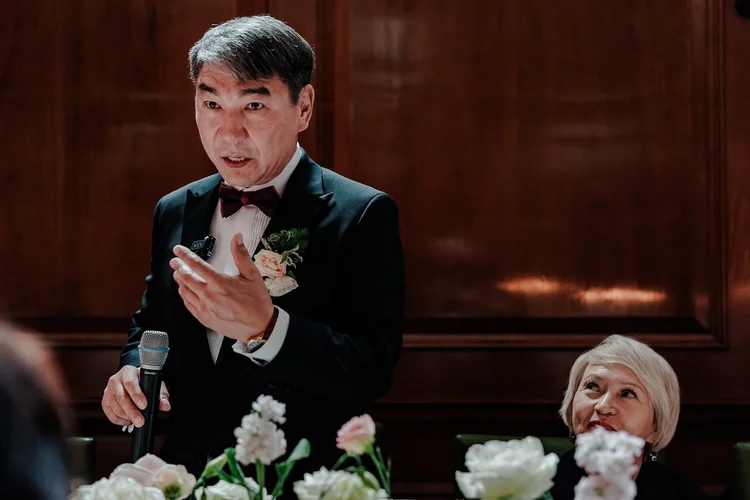 A guest delivering a speech at a wedding at The Ned Hotel