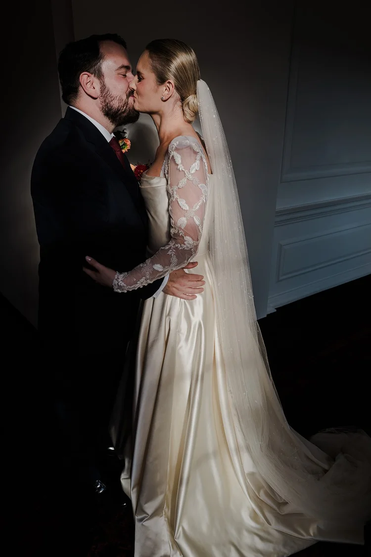 Close, candlelit portrait of a couple at their wedding at The Ned Hotel
