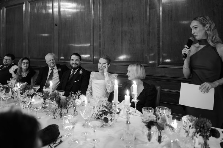 Black and white photograph of a speech at the wedding breakfast at The Ned