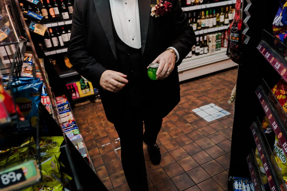 Jon and Meg stopping at a corner shop in black tie after their Chelsea wedding - 1
