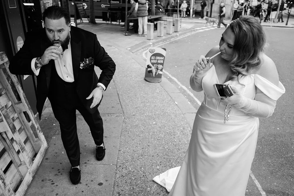 Jon and Meg stopping at a corner shop in black tie after their Chelsea wedding - 3