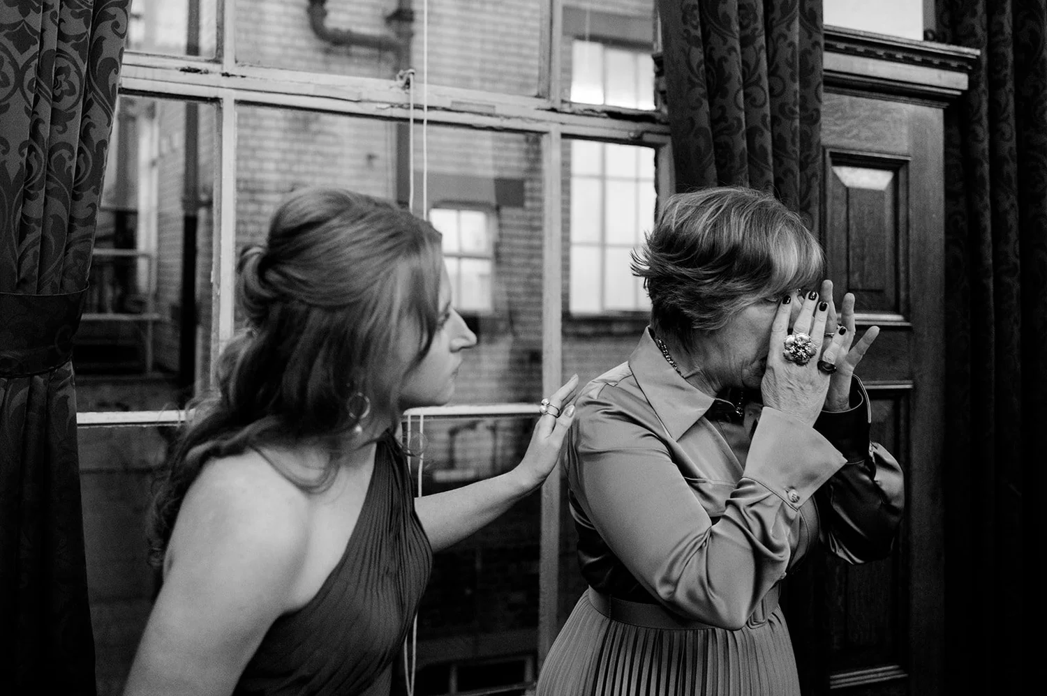 Guests waiting outside Islington Town Hall before the wedding ceremony