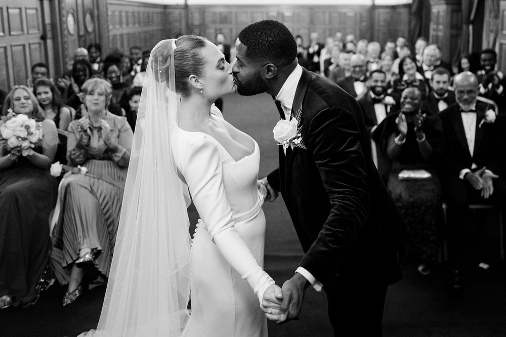 Sophie and Dan&rsquo;s first kiss as a married couple at Islington Town Hall