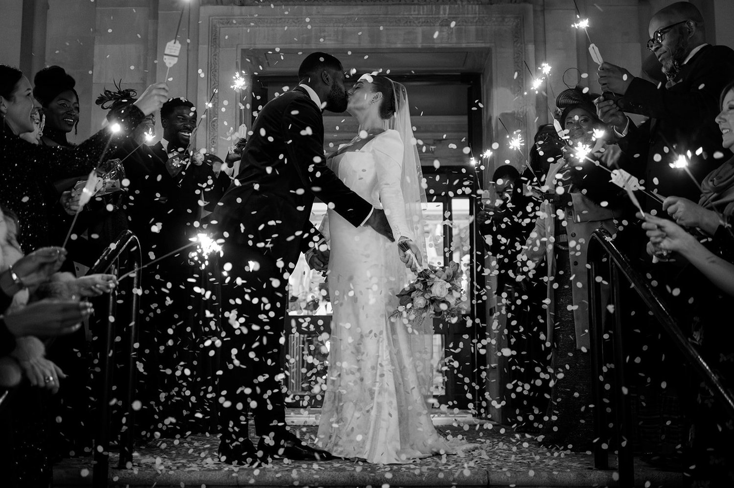Confetti and sparklers as Sophie and Dan leave Islington Town Hall