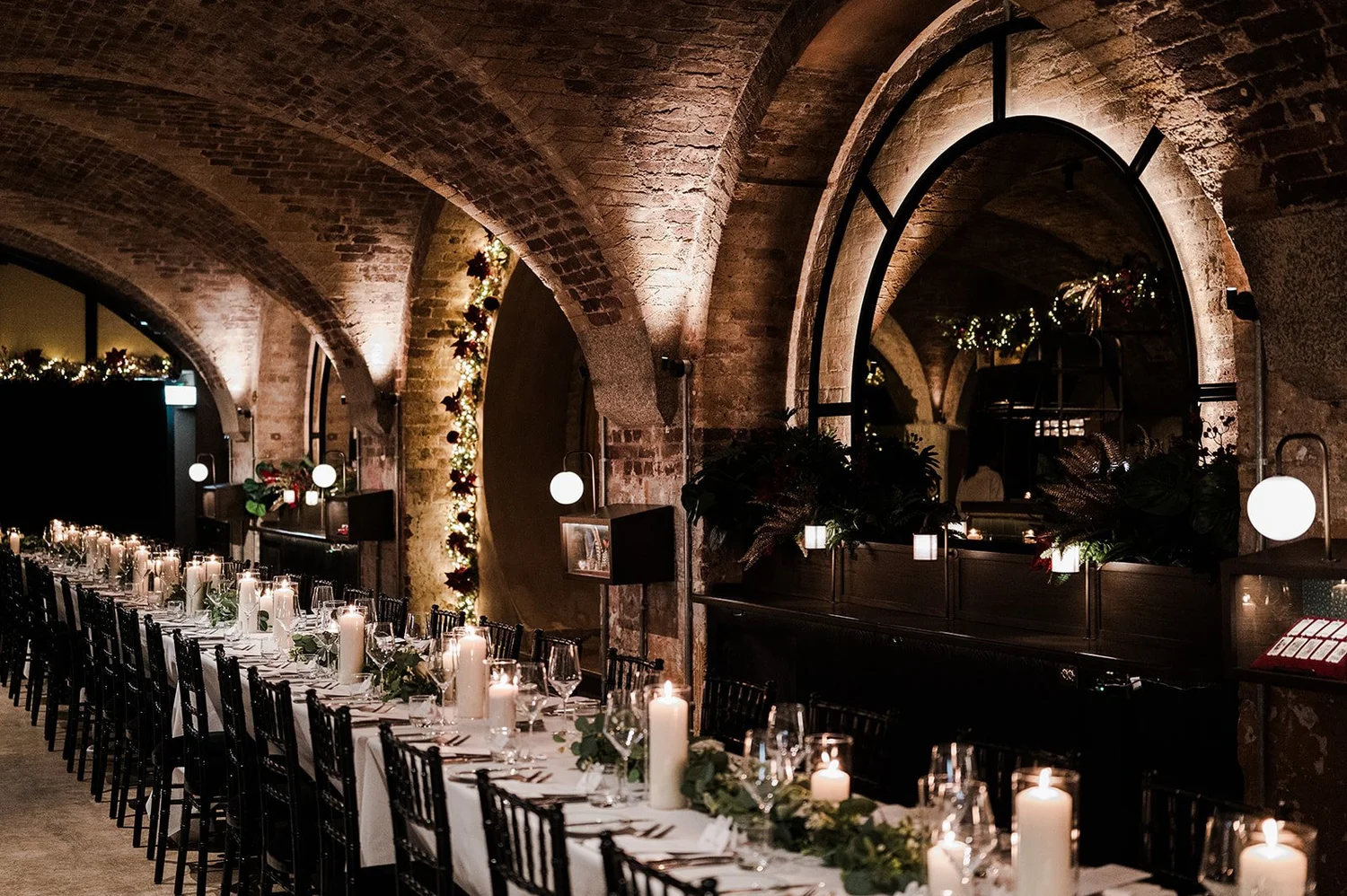 The vaulted reception room set for dinner at The Libertine in the City of London