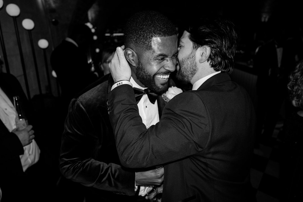 A guest embracing Dan at the wedding reception at The Libertine