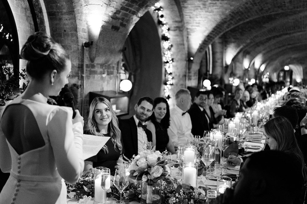 Sophie at the long table under the vaults at The Libertine