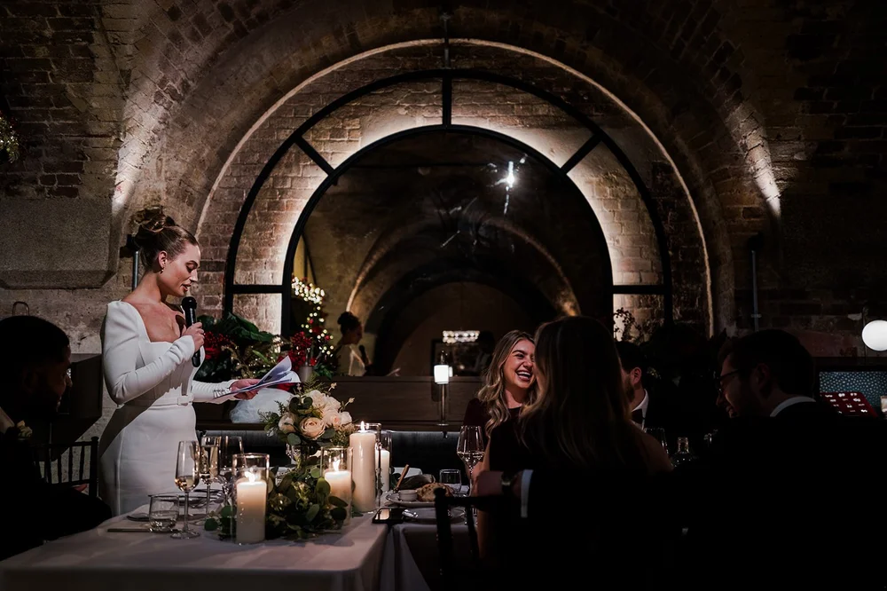Candlelight and flowers on the wedding table at The Libertine