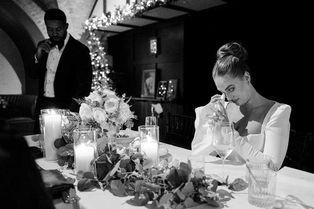 Sophie in tears at the table during the speeches at her wedding