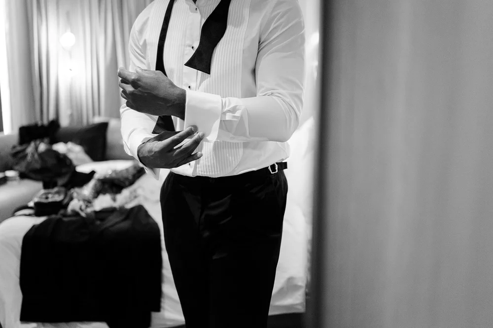 Dan fastening his bow tie before the ceremony at Islington Town Hall
