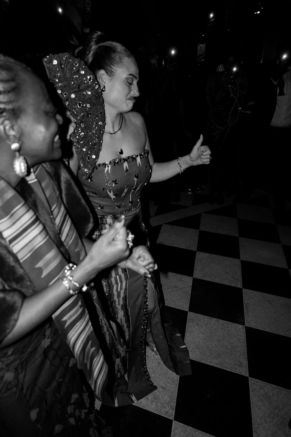 Black and white photograph of the dance floor late in the evening