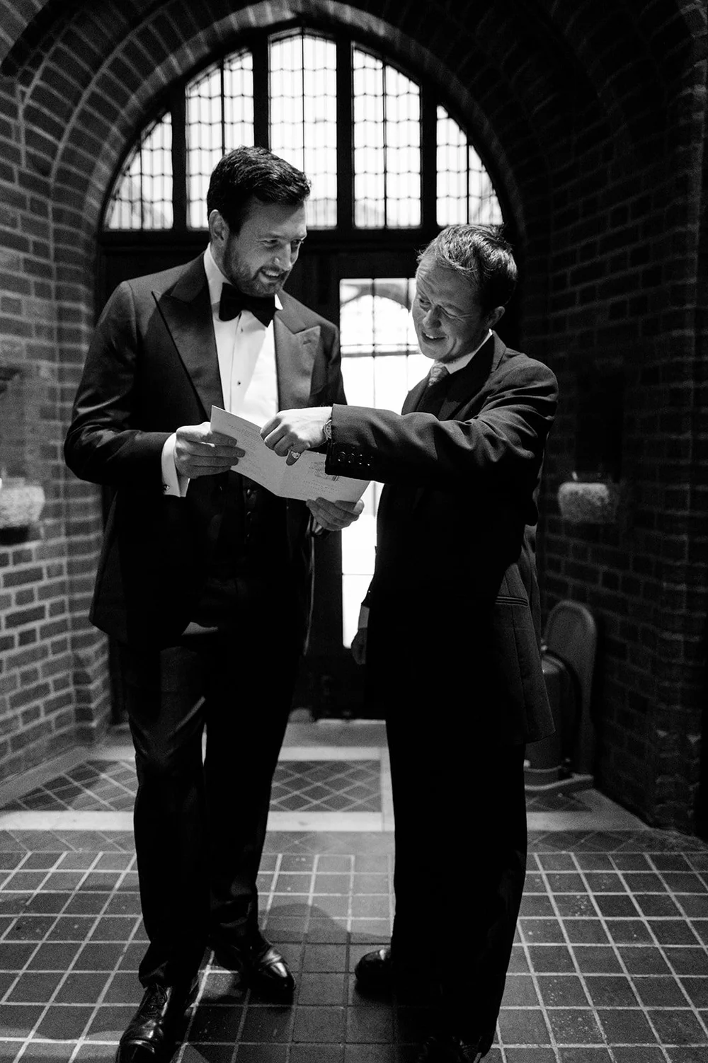 Jon and his best man outside the doors of St Mary&rsquo;s Bourne Street