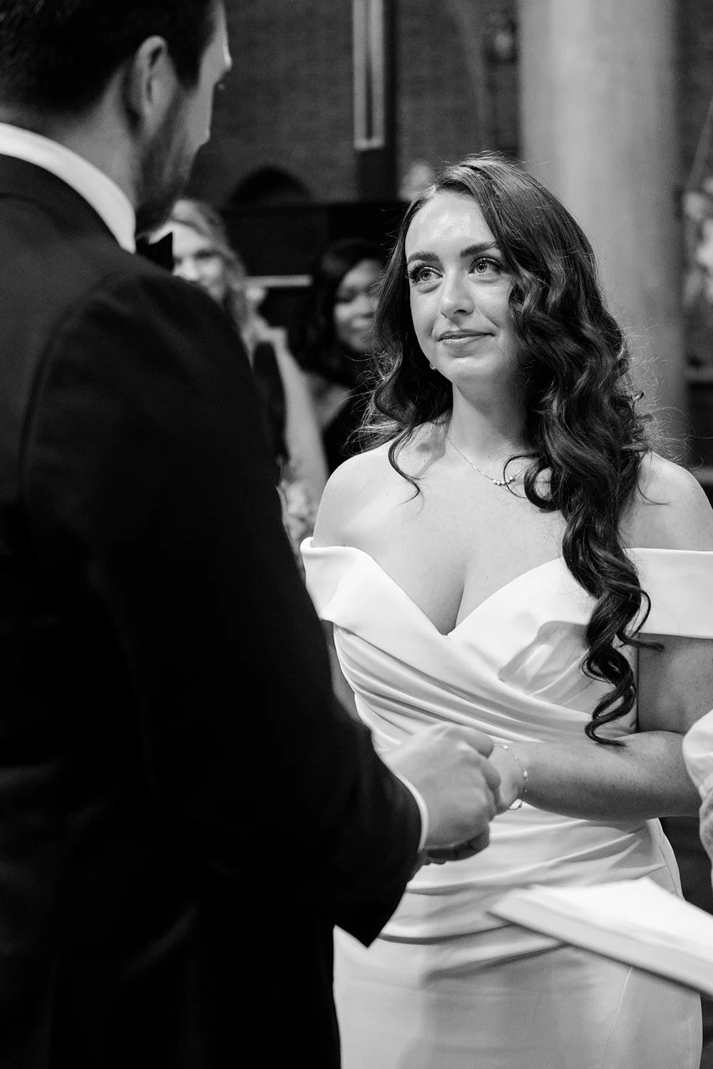 Chloe and Jon facing each other during their ceremony in Pimlico
