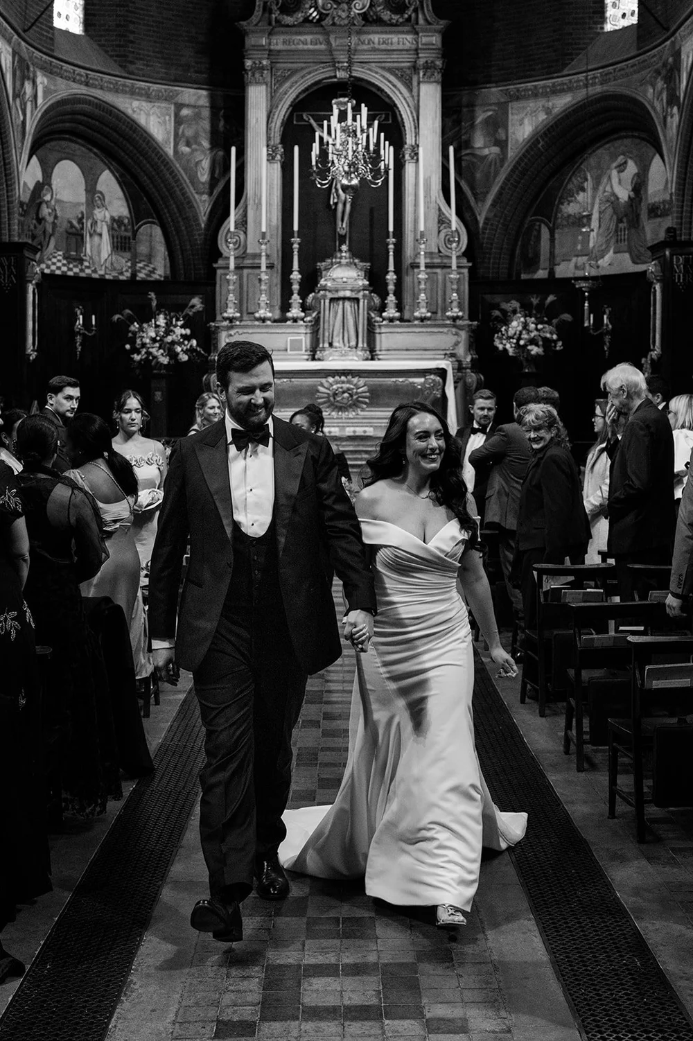 Chloe and Jon walking back down the aisle after their ceremony