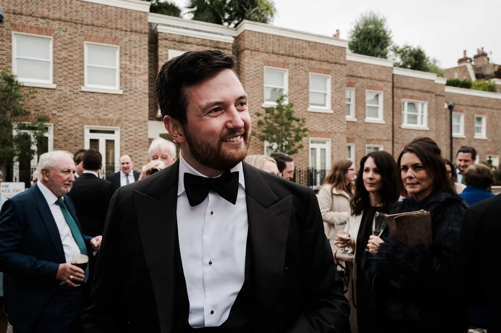 Guests in black tie outside the Fox and Hounds in Belgravia