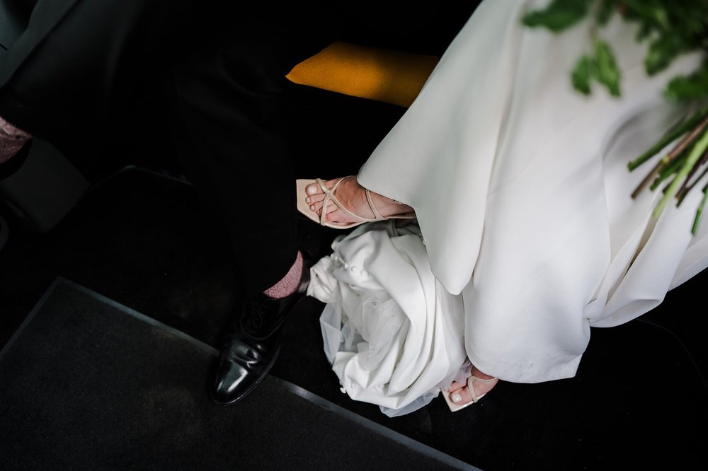 Detail of Chloe&rsquo;s dress and shoes at the drinks reception