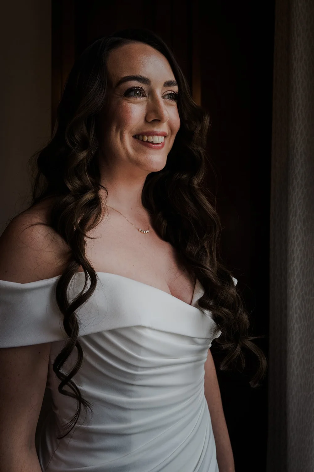 Portrait of Chloe in her wedding dress before the ceremony