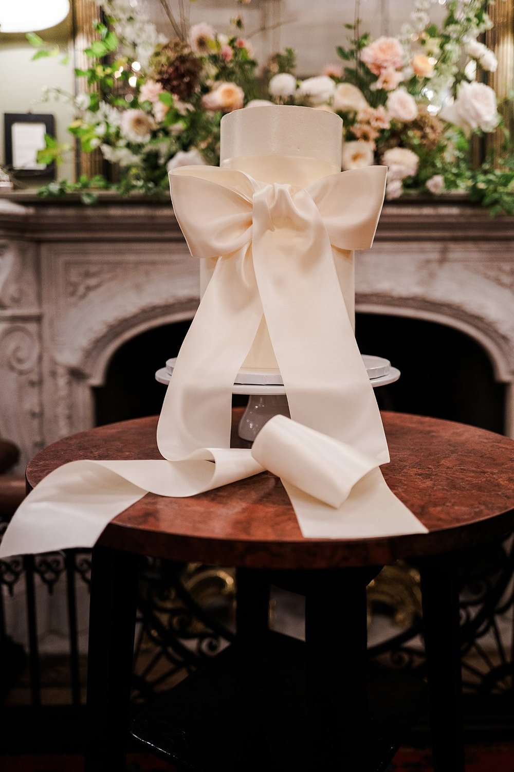 The wedding cake with an oversized bow at Brunswick House