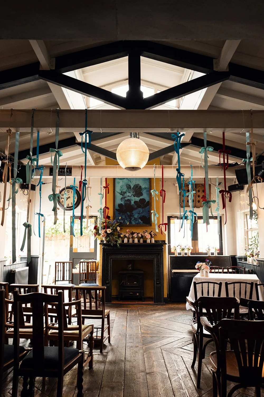 The room at The Alma Tavern set out with chairs for the wedding ceremony