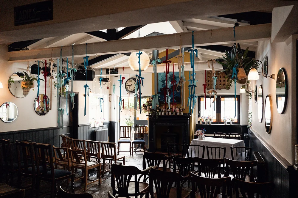 The bar at The Alma Tavern in Clifton dressed with bunting before the wedding