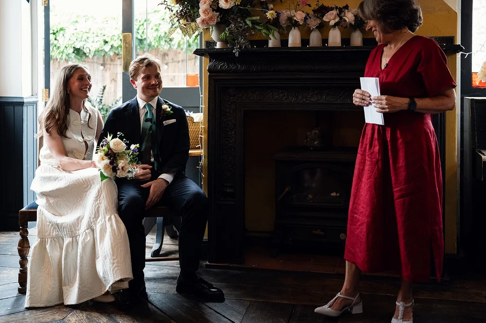 Celia leading the wedding ceremony for Patrick and Ruby at The Alma Tavern