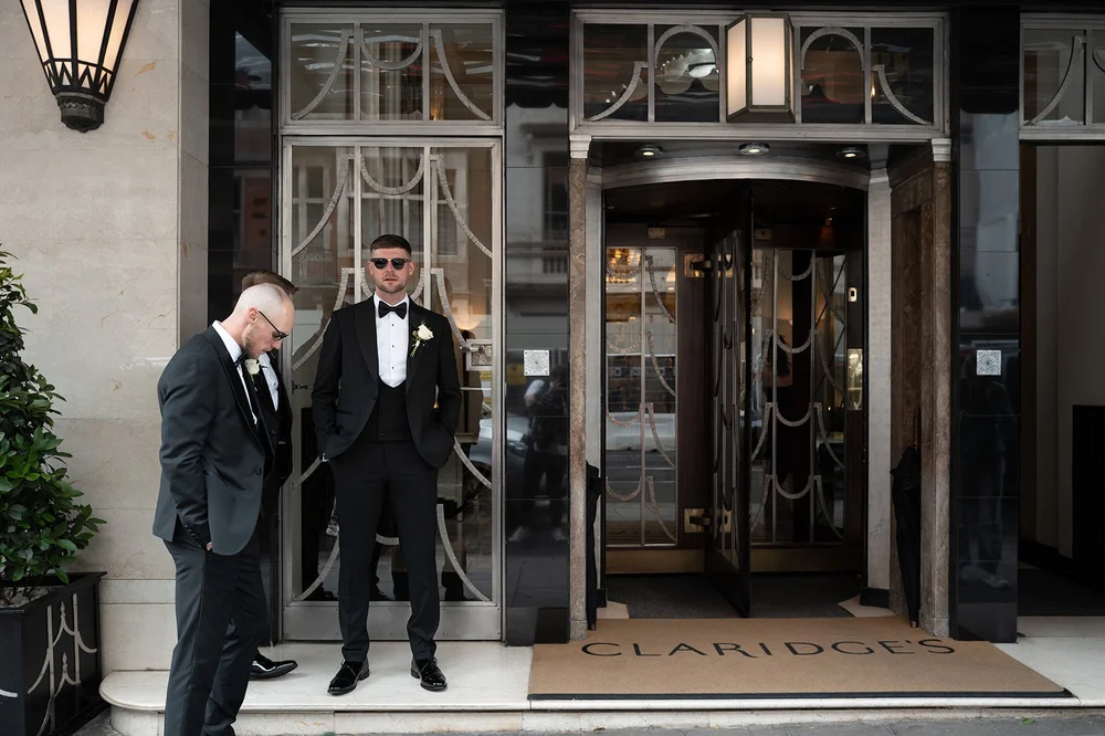 Joe waiting by the lift at Claridge&rsquo;s on the morning of the wedding