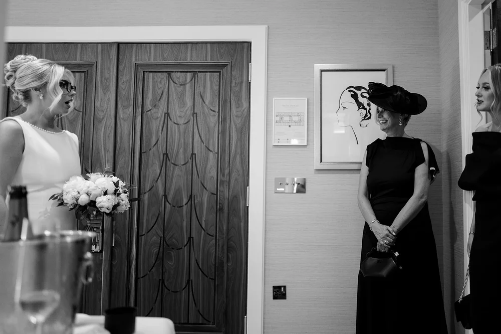 Black and white photograph of Charley getting ready at Claridge&rsquo;s