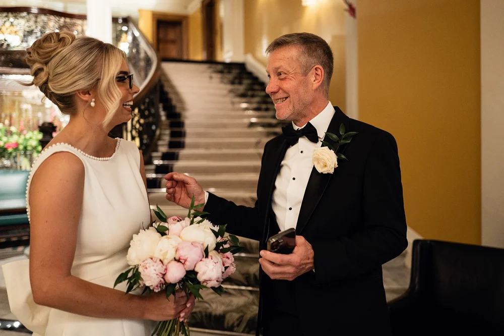 Charley and Joe together with her bouquet before leaving for Chelsea Old Town Hall
