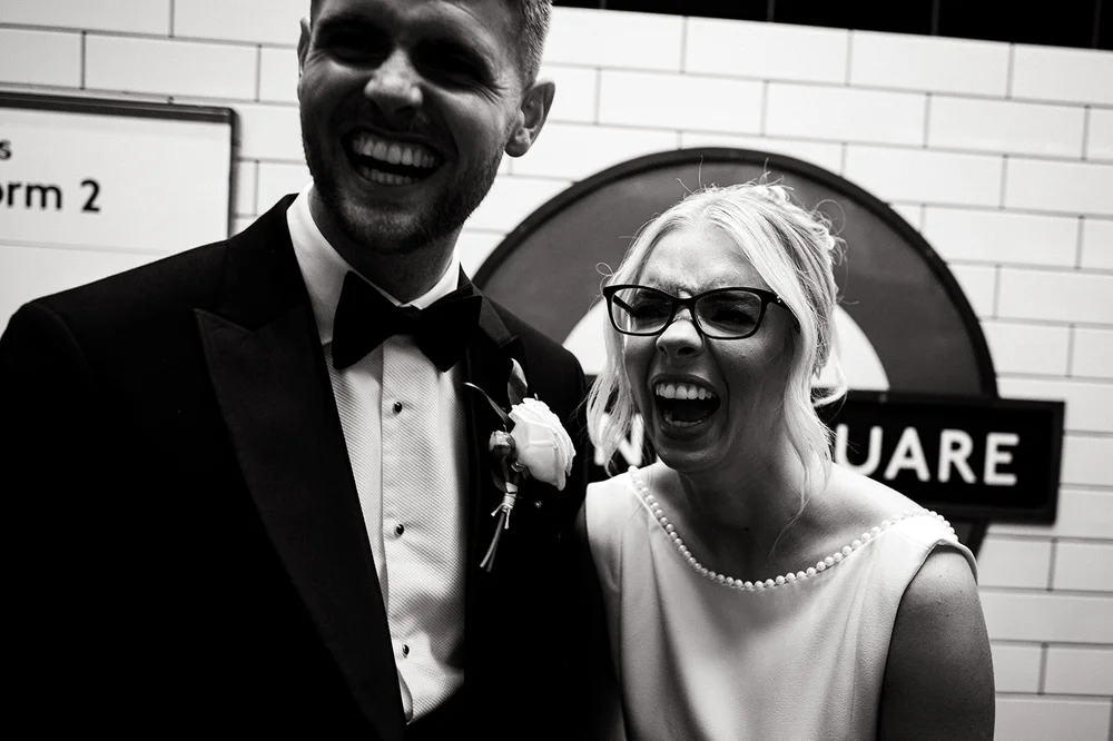 Black and white photograph of Charley and Joe at Sloane Square underground station