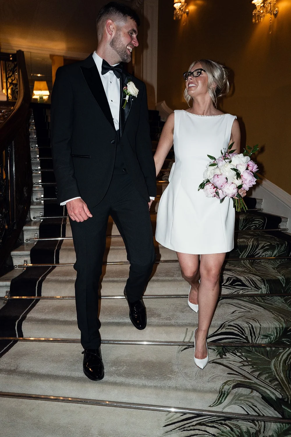 Charley and Joe walking back through the lobby at Claridge&rsquo;s
