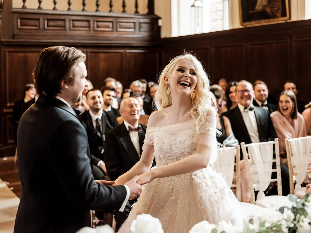 Bride laughing during the ceremony