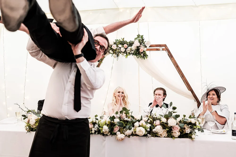 A guest lifted upside down into the air during the evening
