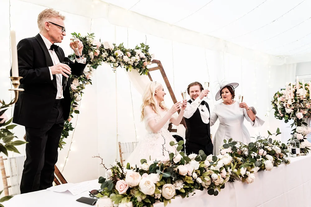Bride applauding during a speech