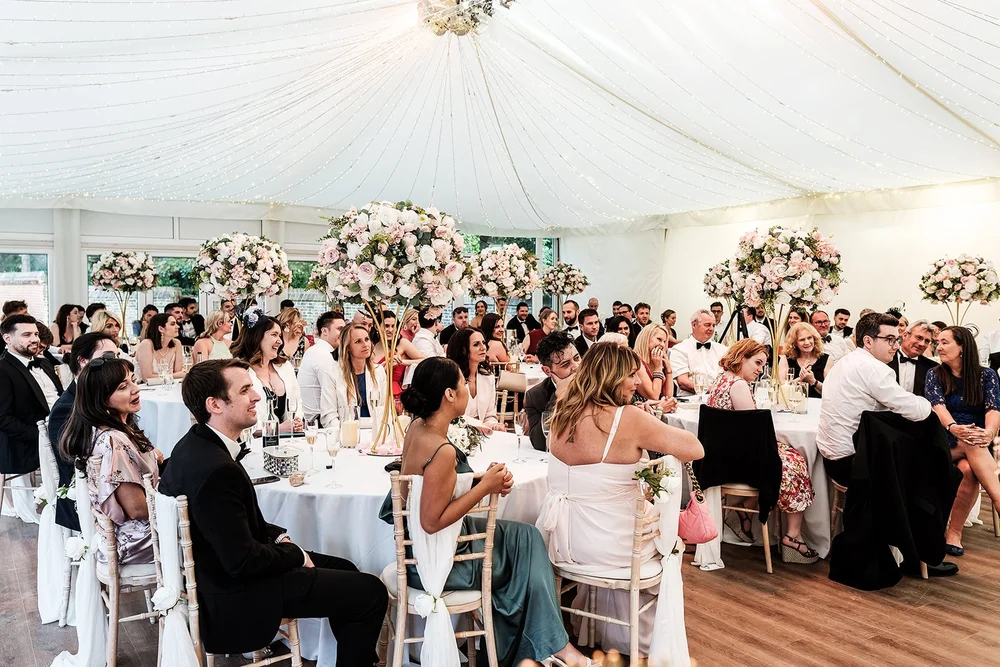 The marquee full of guests during the wedding breakfast
