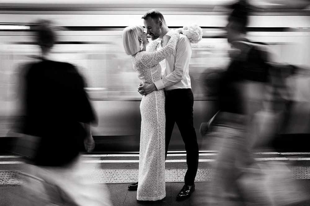 Elisa and Greg laughing together during their London couple portraits