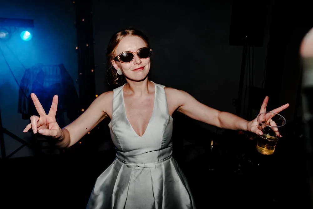 Grace in her silver evening dress on the dance floor