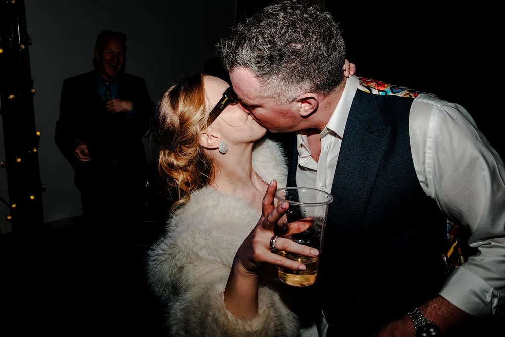 Grace and Jordan kissing on the dance floor at the end of the night