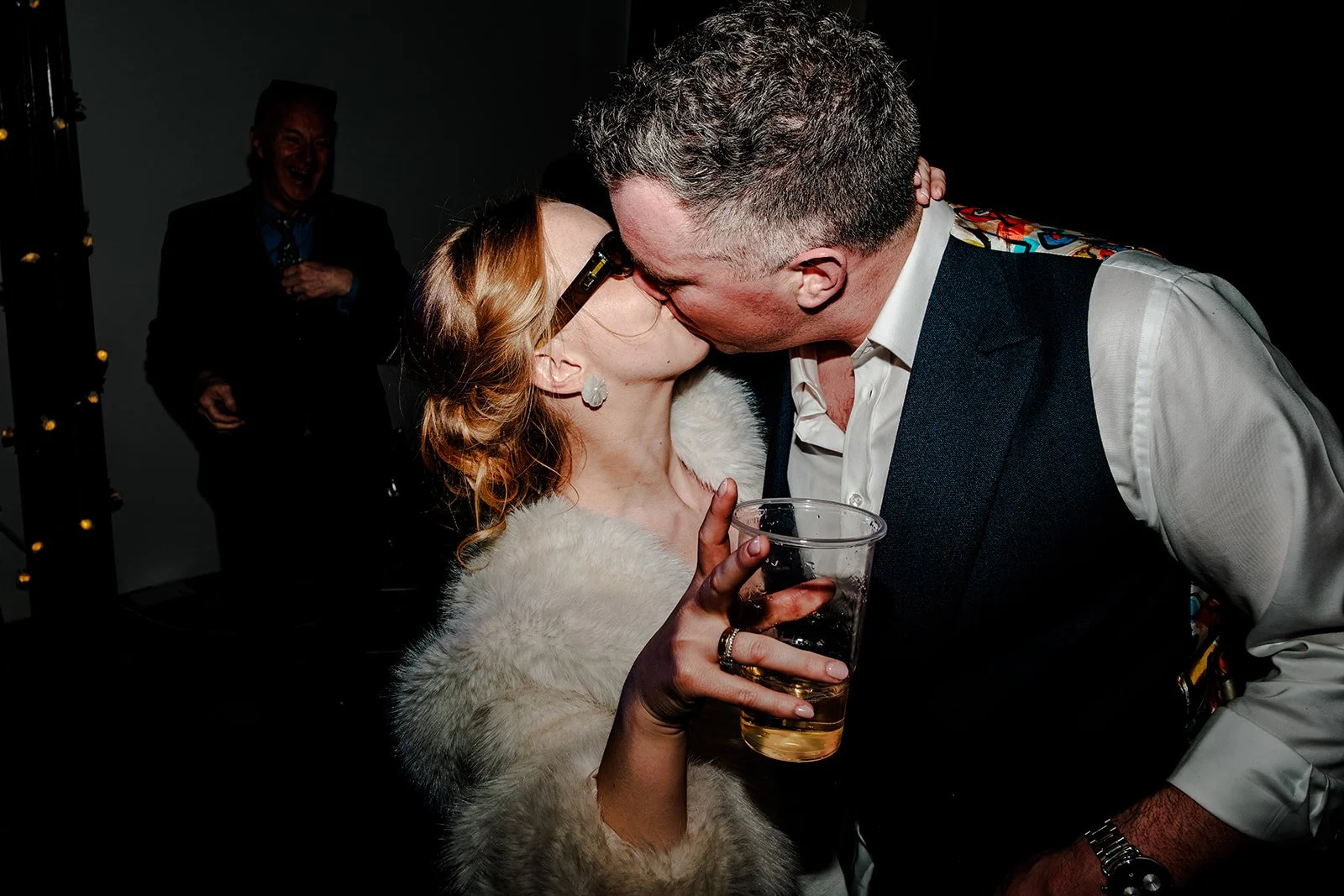 Grace and Jordan kissing on the dance floor at their Fabrica wedding in Brighton