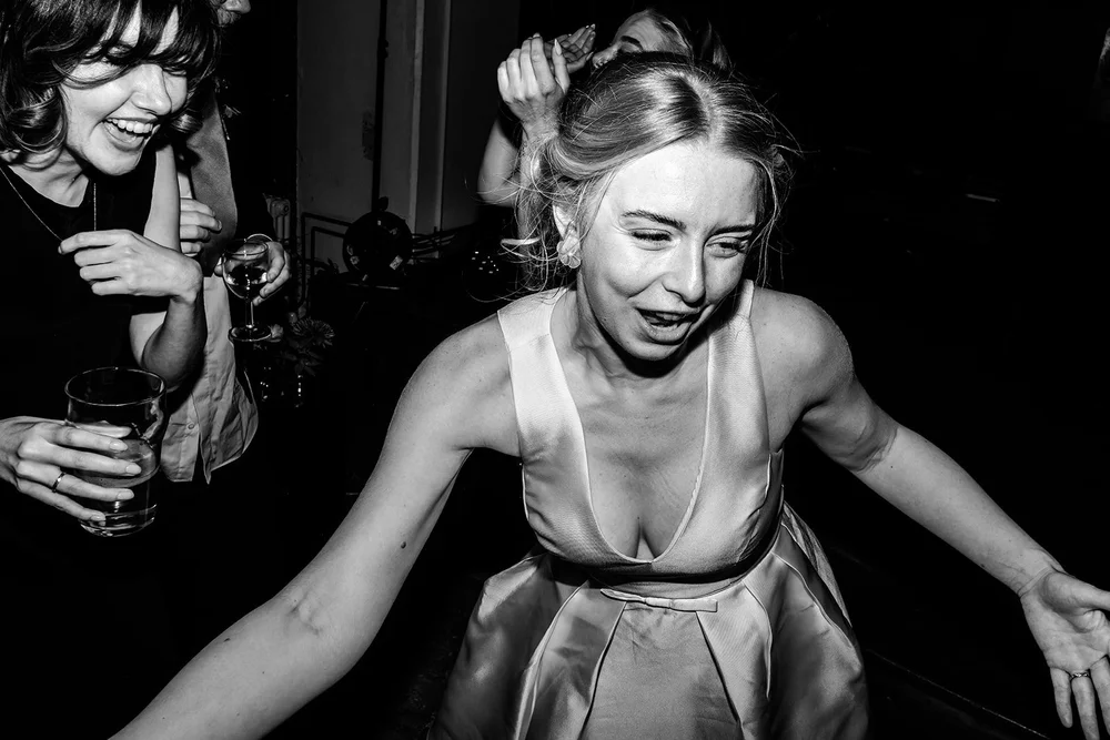 Grace dancing in her silver evening dress at Fabrica