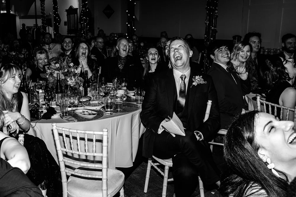 Wedding guests reacting to a speech at Fabrica Brighton
