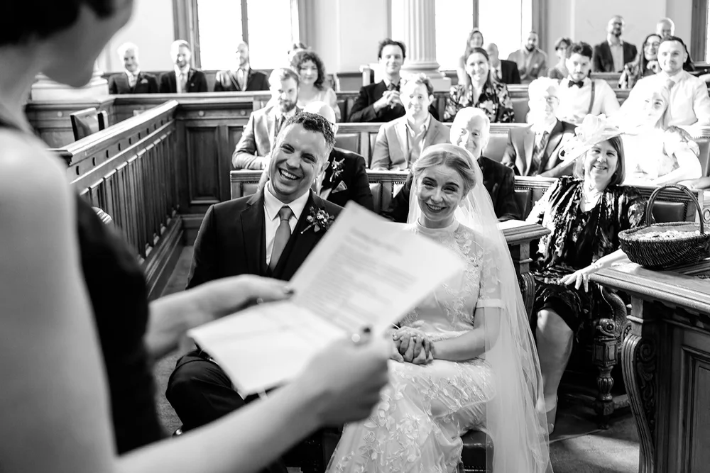 A reading during Grace and Jordan&rsquo;s civil ceremony at Brighton Town Hall